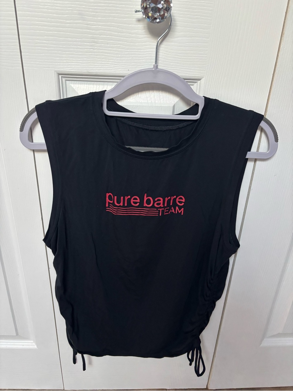 Tavi x Pure Barre Black Muscle Tee with Red Logo